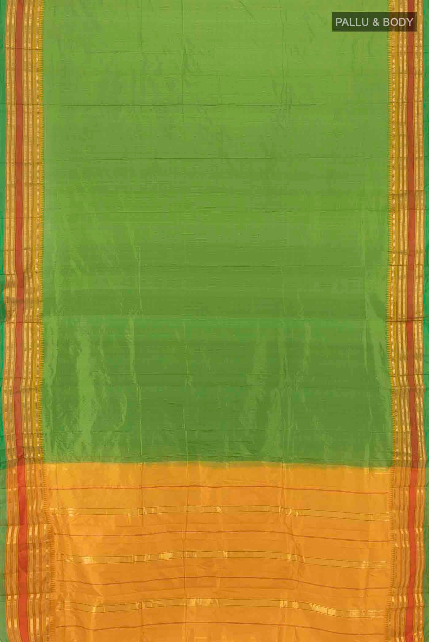 Flat view of Bottle Green Narayanpet Silk Saree with Zari Butta on the body and Silk Border. 