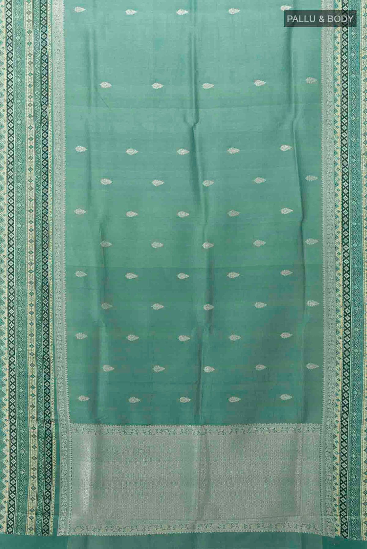Flat view of Light Green Tussar Silk Saree with Floral Print on the body and Silk Border