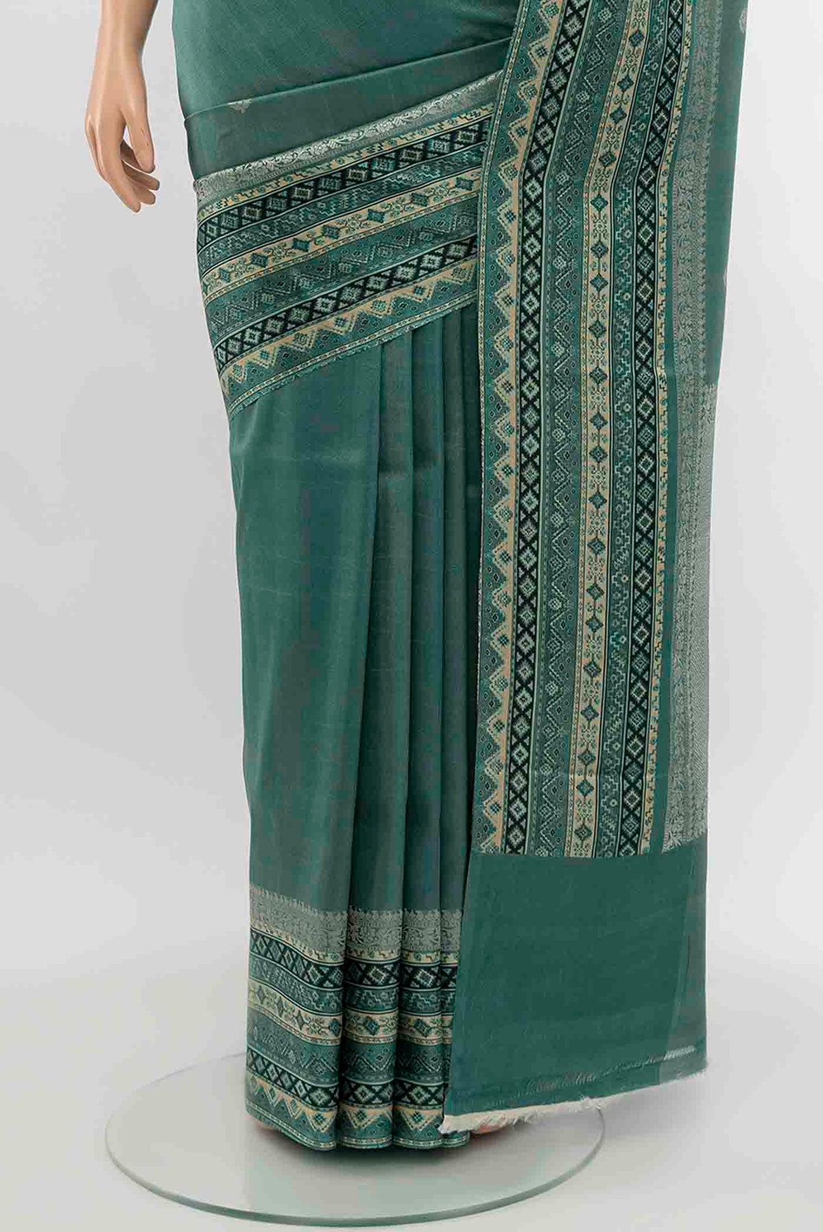 Pleats and pallu of Light Green Tussar Silk Saree with Floral Print on the body and Silk Border