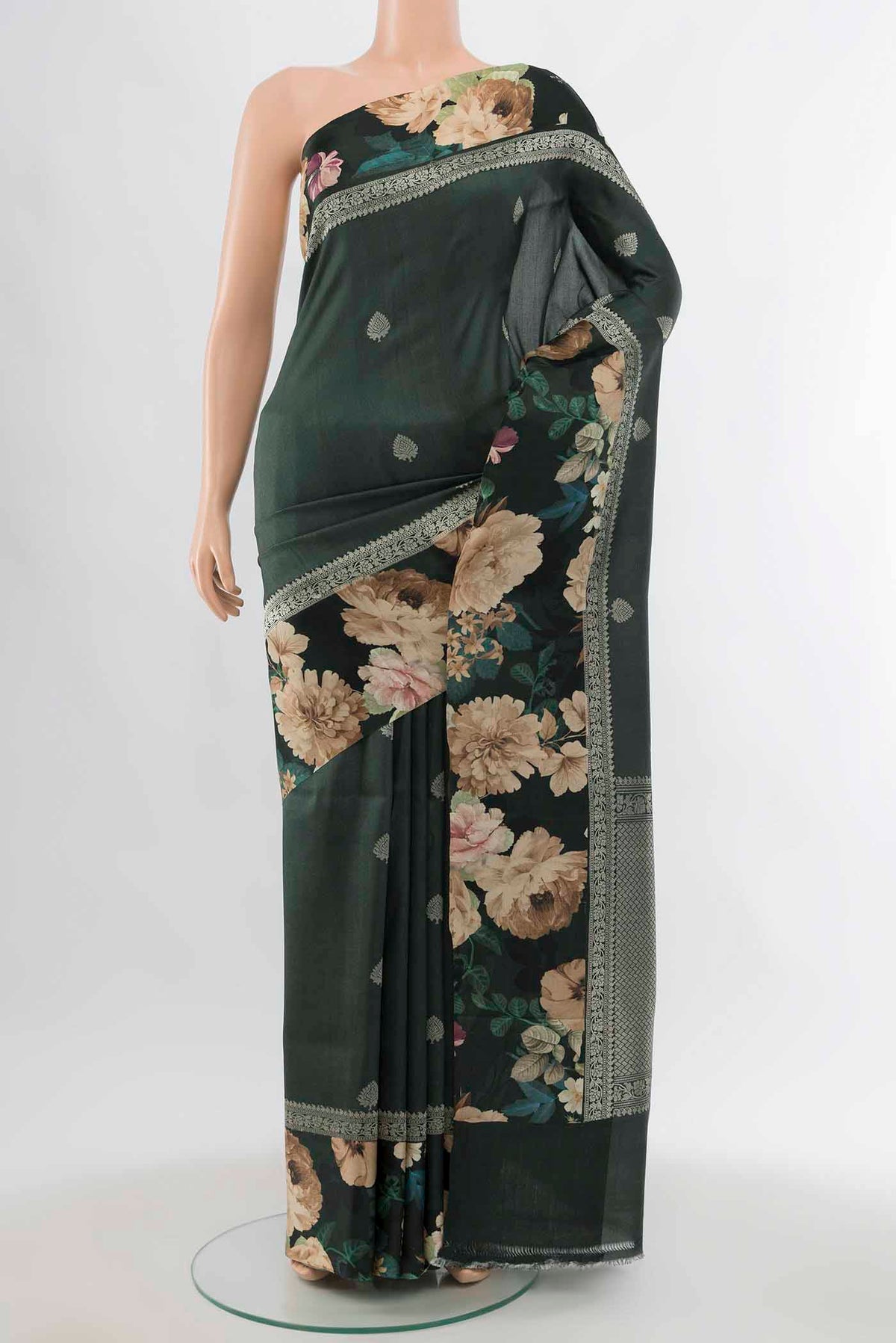 Bottle Green Tussar Silk Saree with Zari Butta on the body and Fancy Border displayed on a mannequin