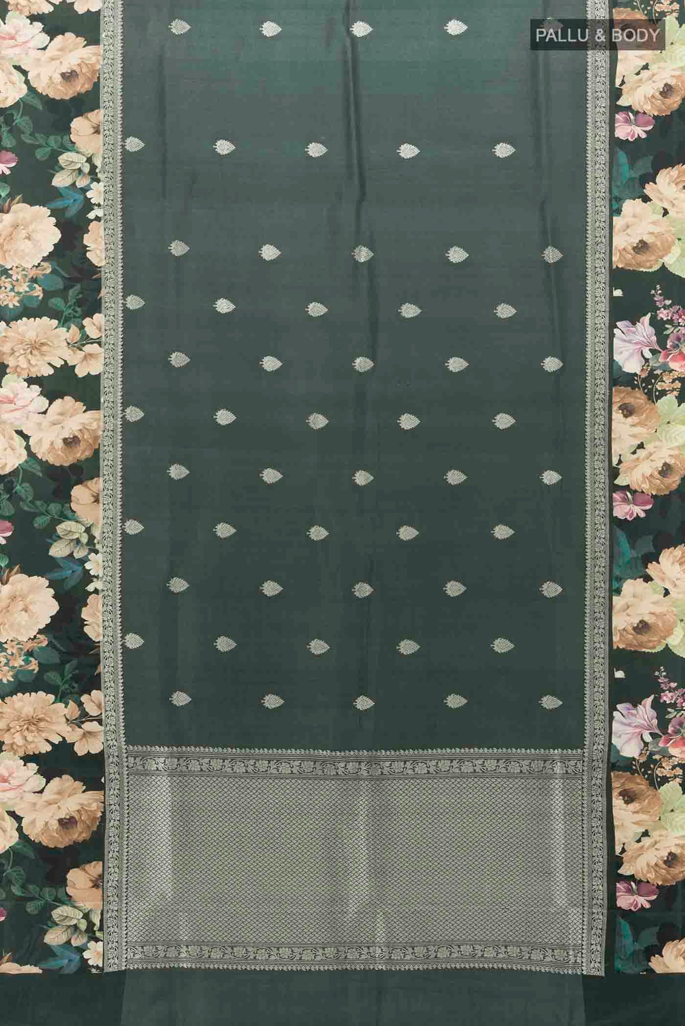 Flat view of Bottle Green Tussar Silk Saree with Zari Butta on the body and Fancy Border