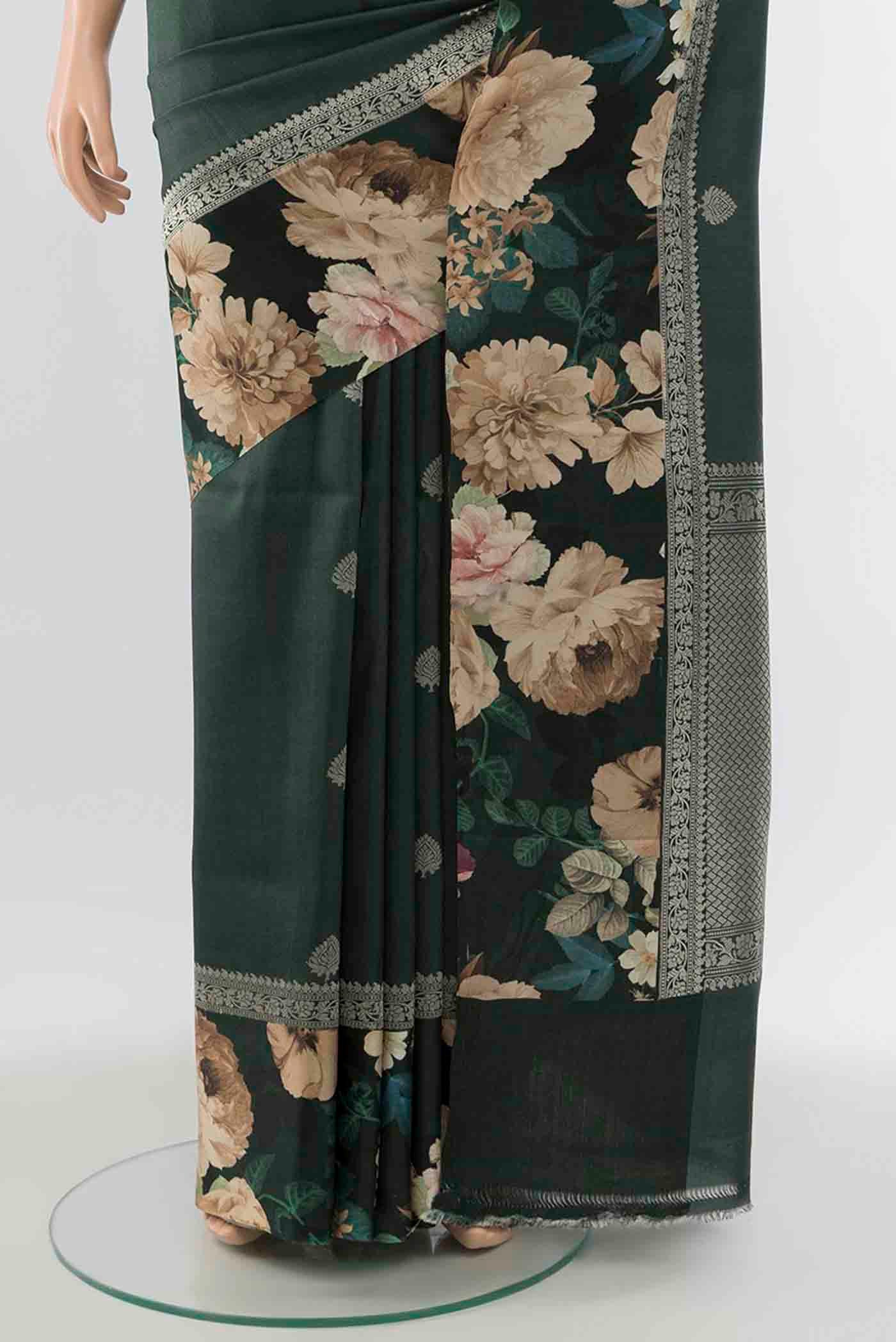 Pleats and pallu of Bottle Green Tussar Silk Saree with Zari Butta on the body and Fancy Border