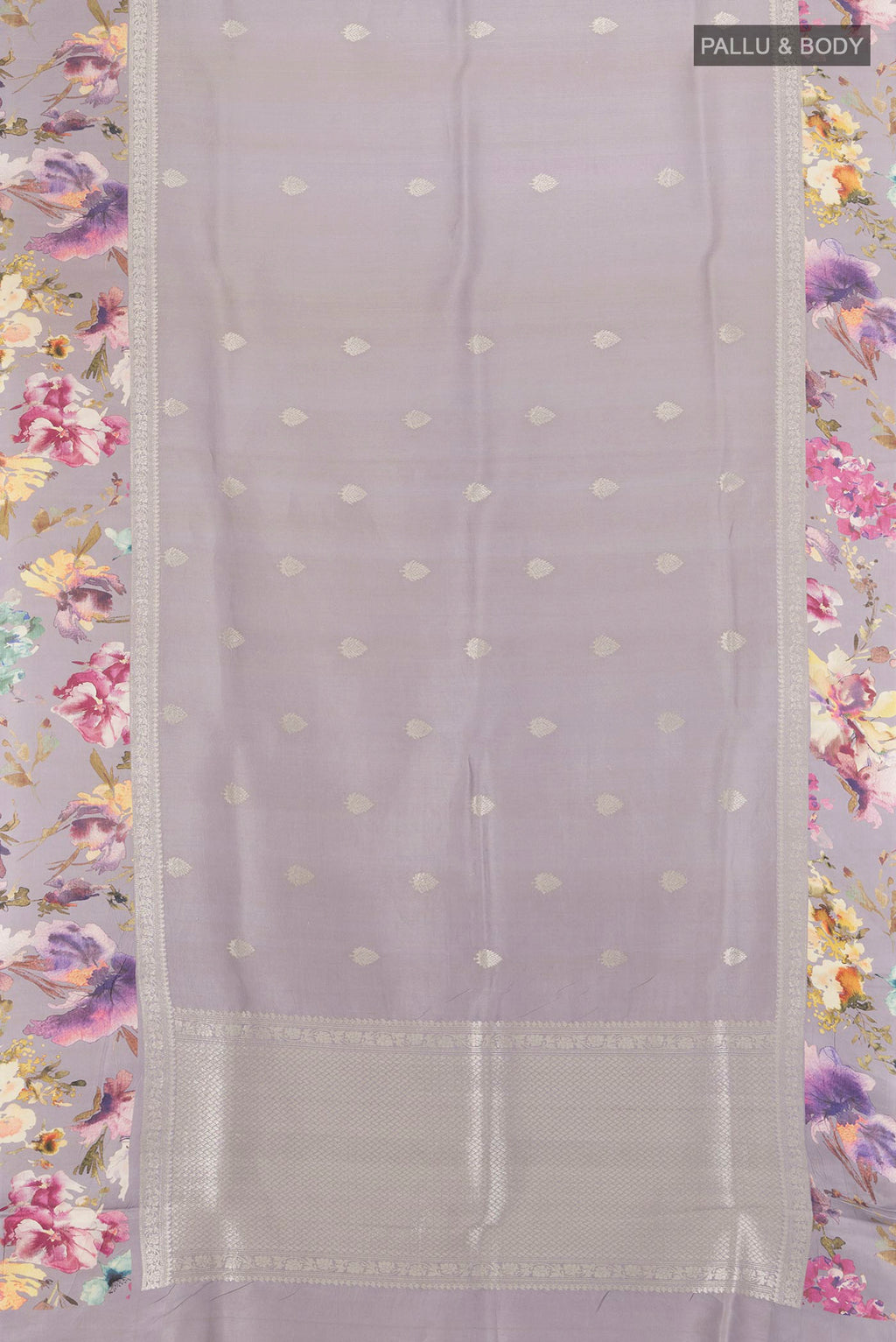 Flat view of Davys Grey Tussar Silk Saree with Zari Butta on the body and Fancy Border. 