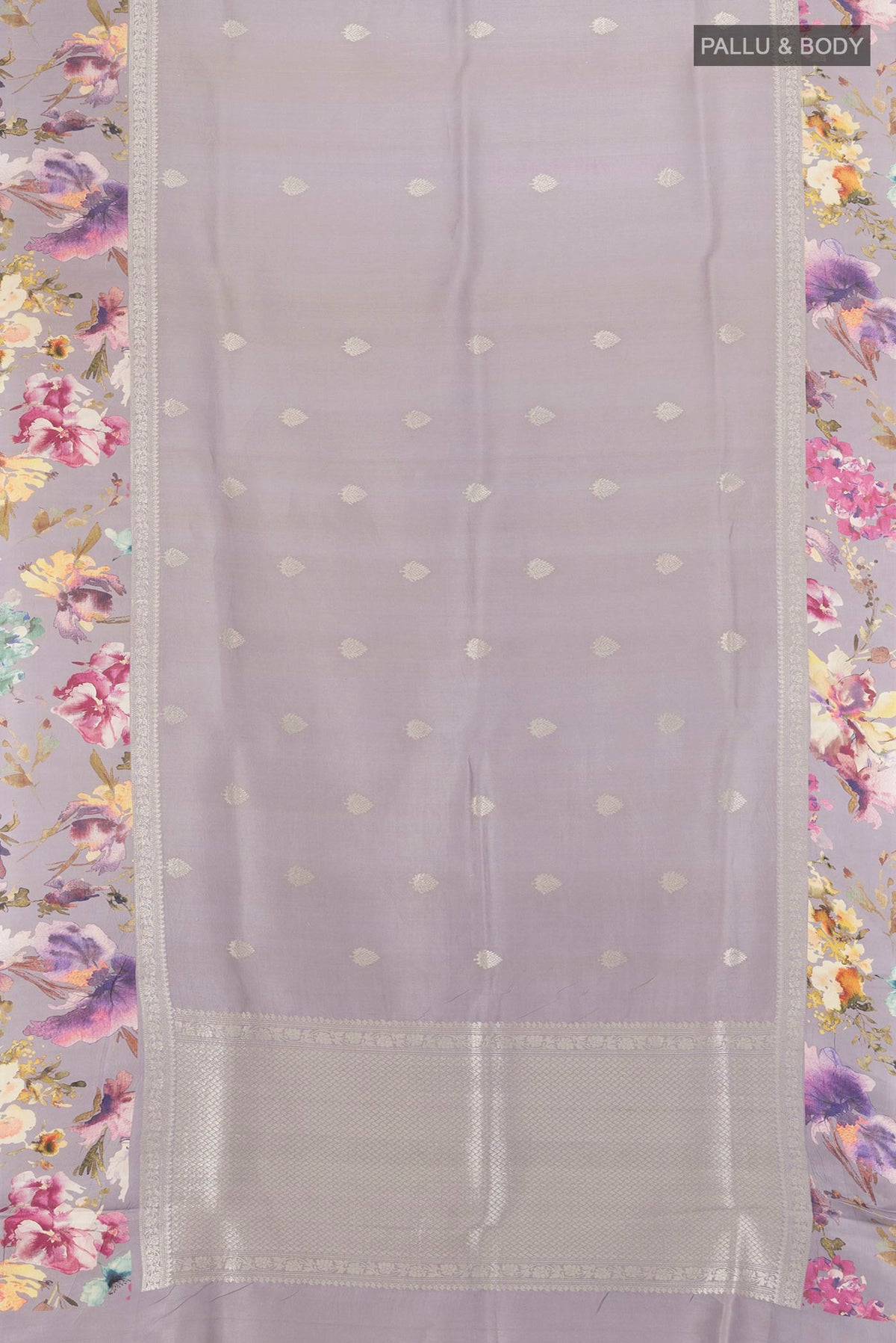 Flat view of Davys Grey Tussar Silk Saree with Zari Butta on the body and Fancy Border. 