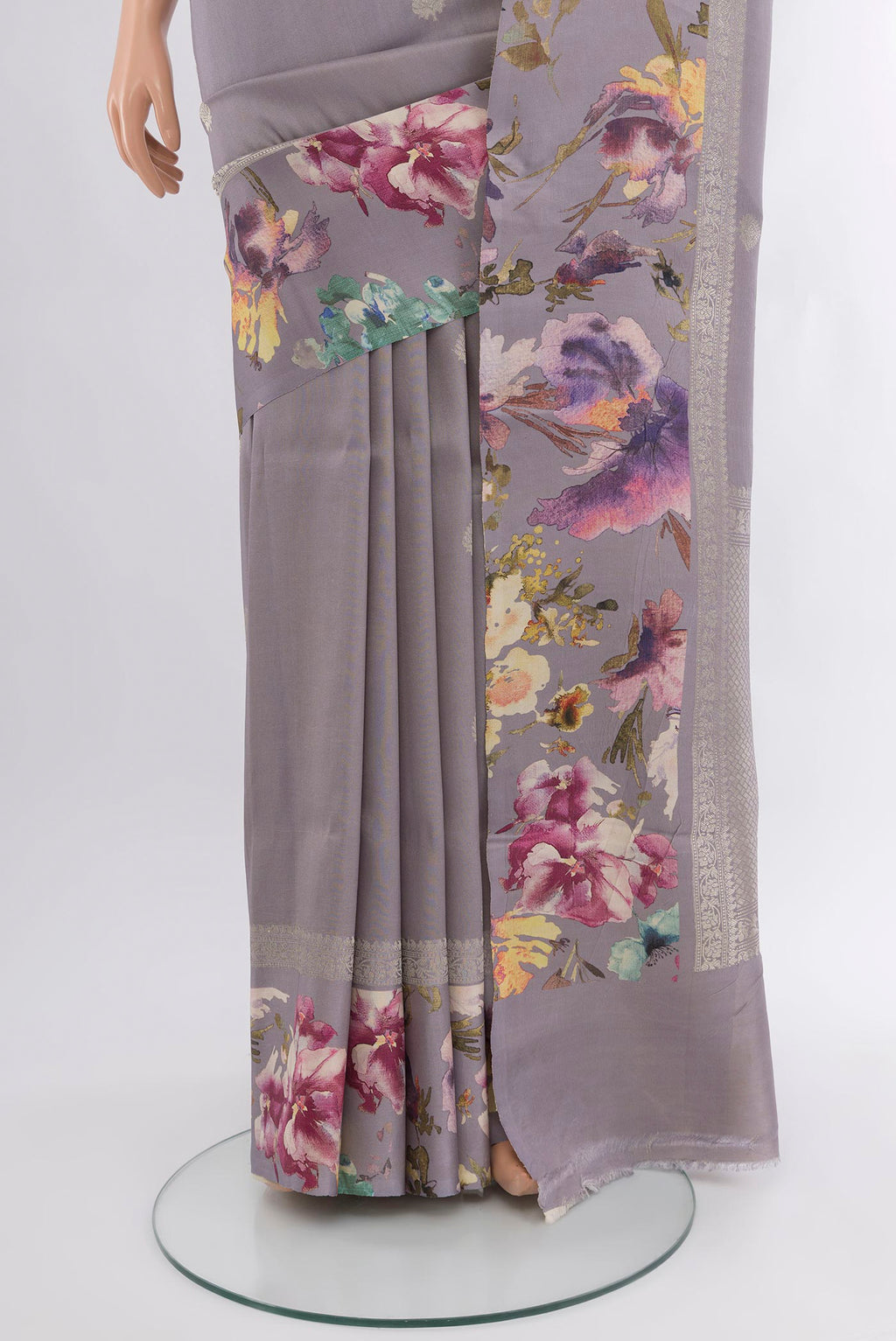 Pleats and pallu of Davys Grey Tussar Silk Saree with Zari Butta on the body and Fancy Border. 