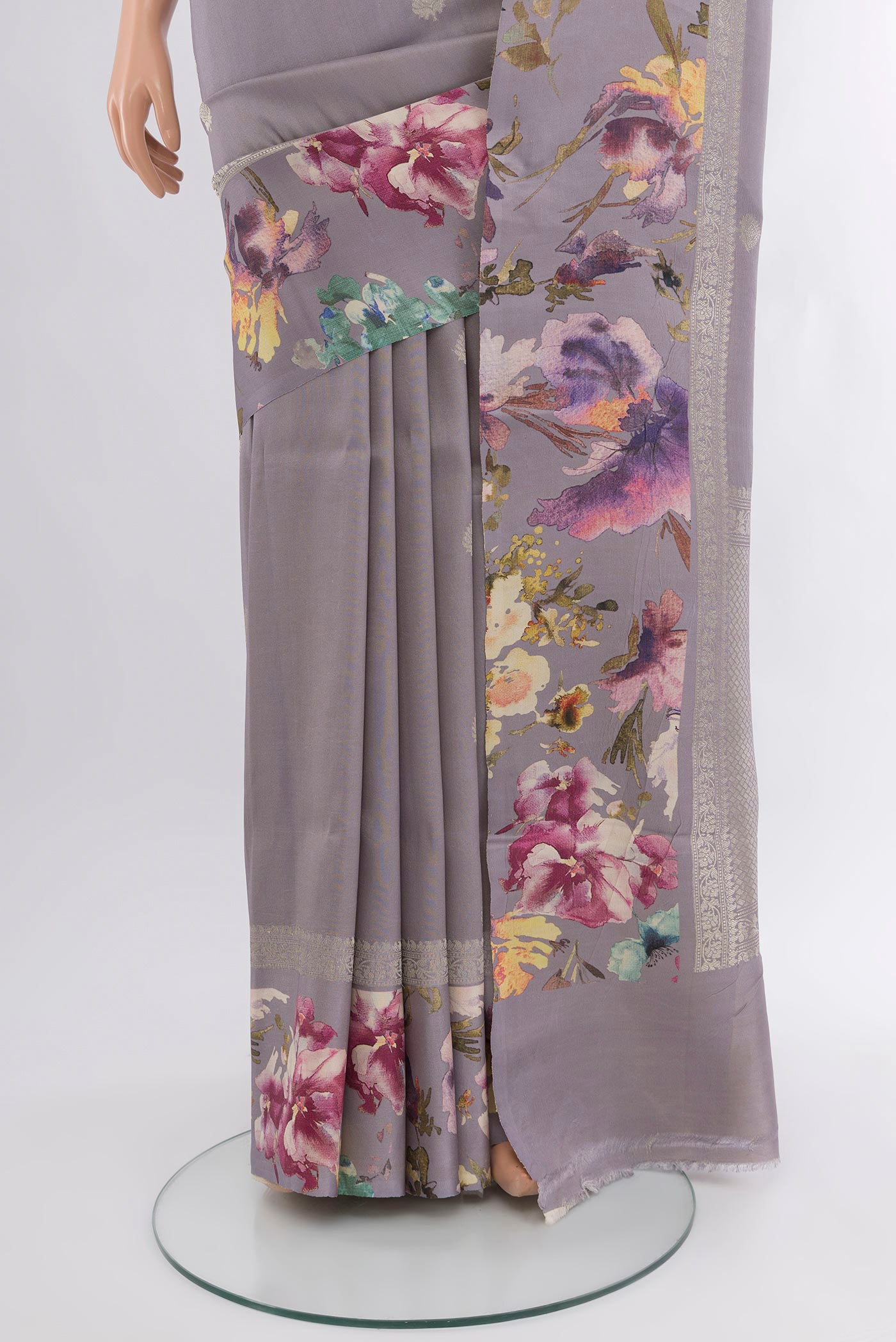 Pleats and pallu of Davys Grey Tussar Silk Saree with Zari Butta on the body and Fancy Border. 