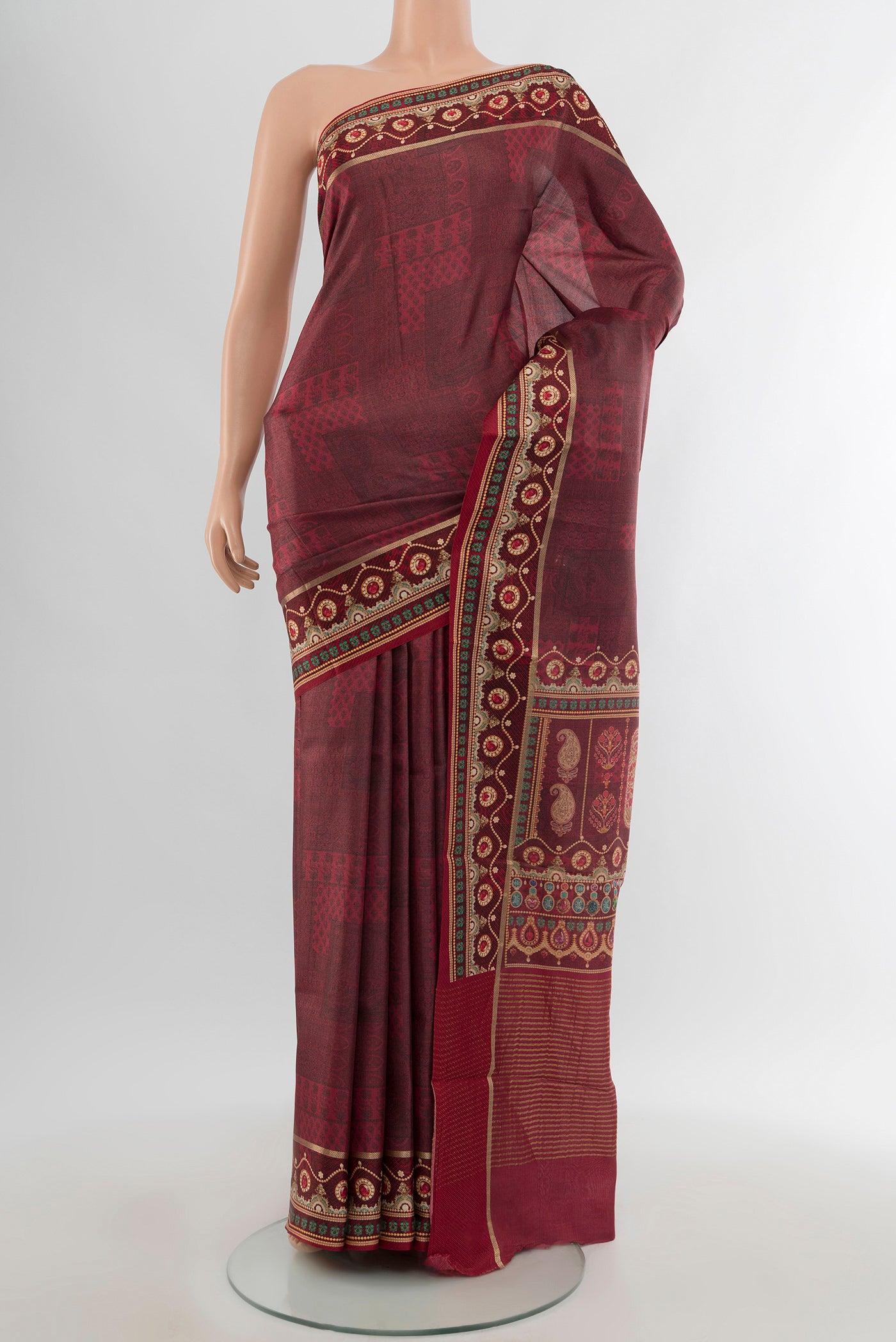 Brown Tussar Silk Saree with Printed design on the body and Printed Border.  displayed on a mannequin