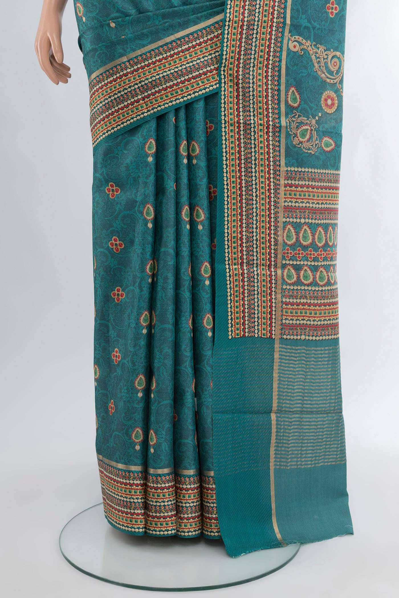 Pleats and pallu of Blue Tussar Silk Saree with Floral Print on the body and Printed Border. 