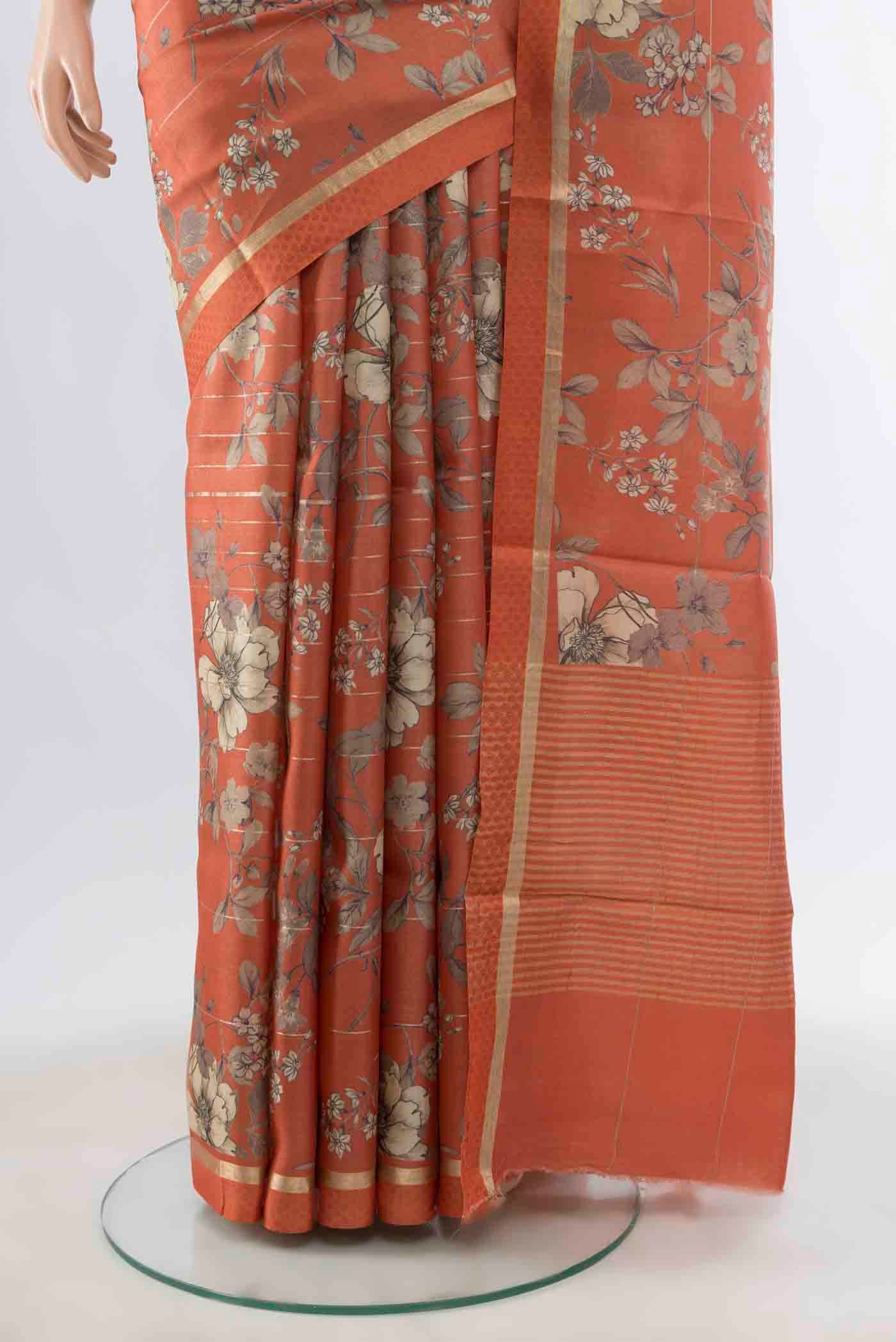 Pleats and pallu of Brick Orange Tussar Silk Saree with Zari Butta on the body and Silk Border