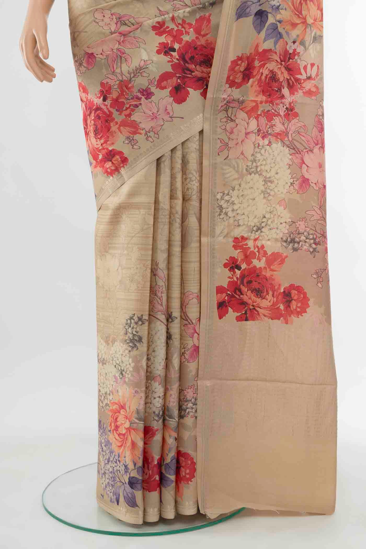 Pleats and pallu of Cream Tussar Silk Saree with Floral Print on the body and Thread Border