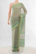 Light Green Maheshwari Silk Cotton Saree with Zari Butta on the body and Fancy Border displayed on a mannequin