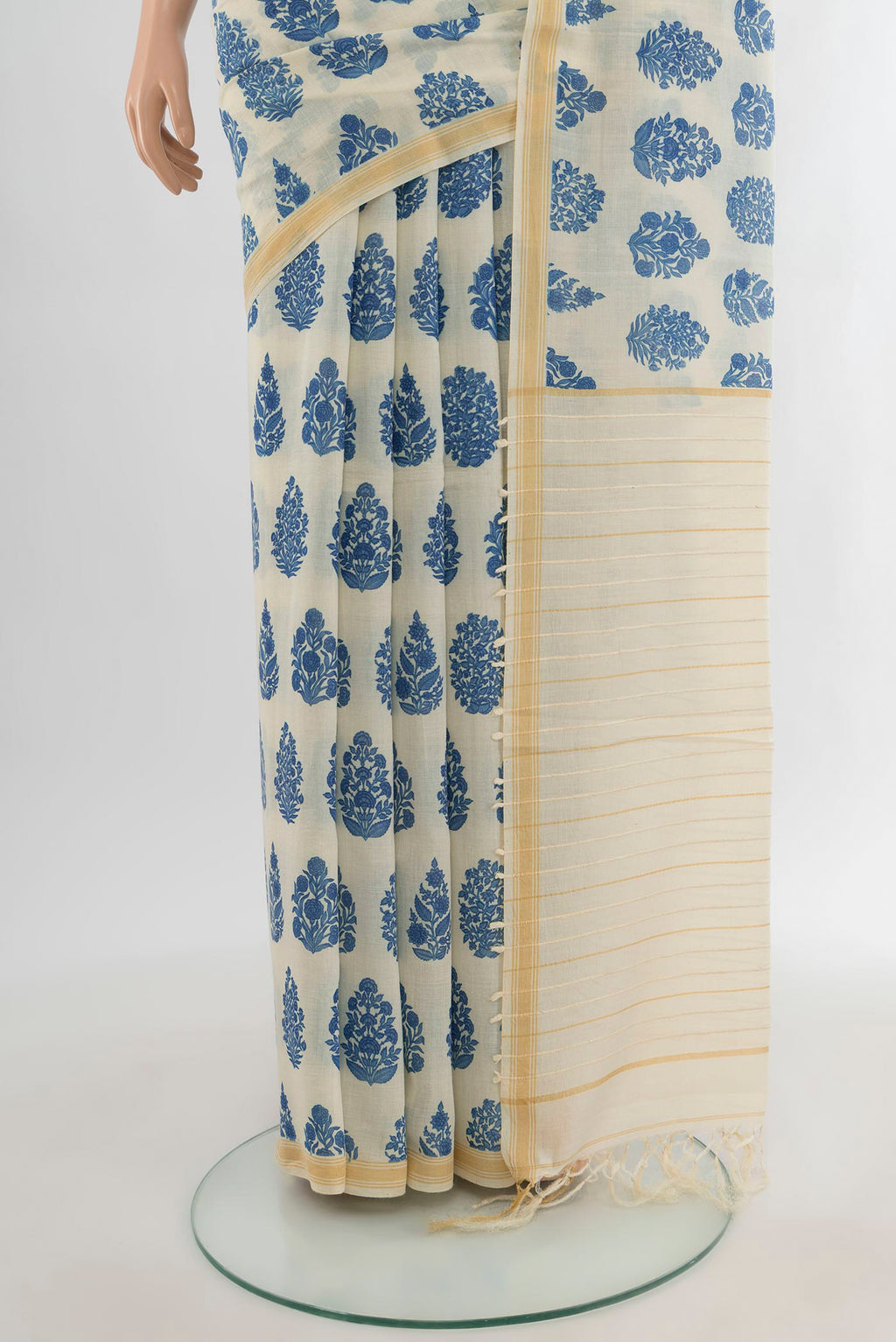 Pleats and pallu of Cream Tussar Silk Saree with Floral Print on the body and Plain Border. 