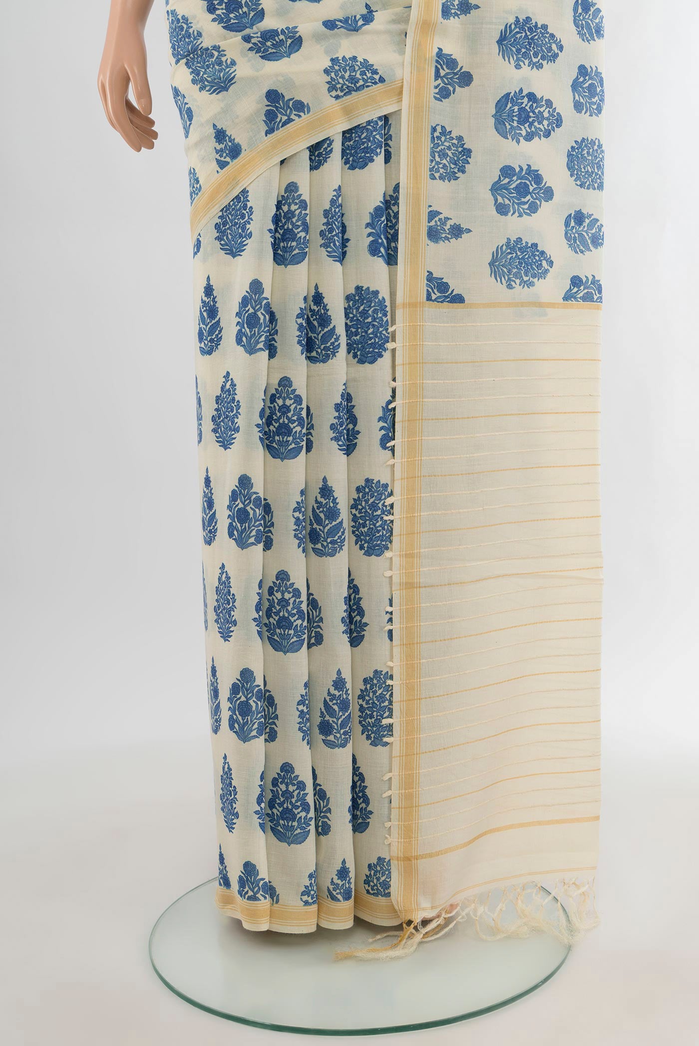 Pleats and pallu of Cream Tussar Silk Saree with Floral Print on the body and Plain Border. 