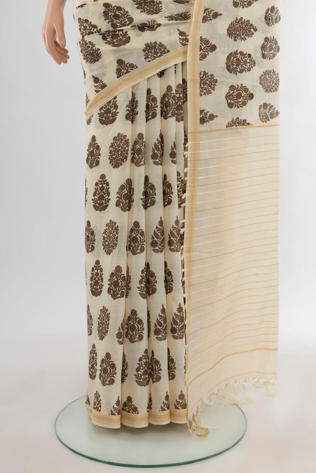 Pleats and pallu of Beige Tussar Silk Saree with Floral Print on the body and Plain Border. 