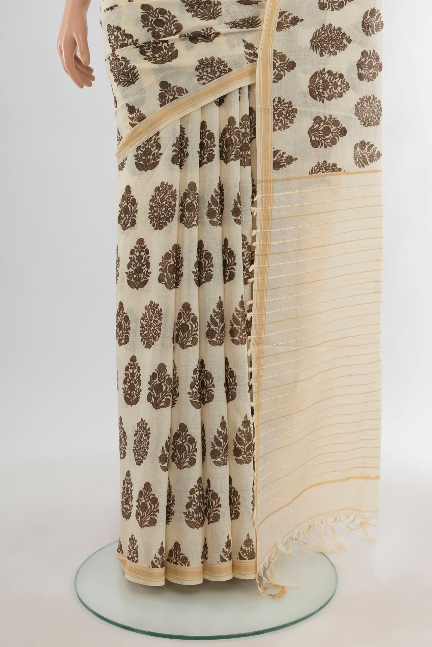 Pleats and pallu of Beige Tussar Silk Saree with Floral Print on the body and Plain Border. 