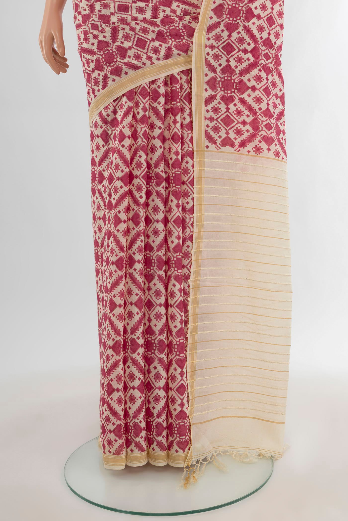 Pleats and pallu of Pink Tussar Silk Saree with Floral Print on the body and Plain Border. 