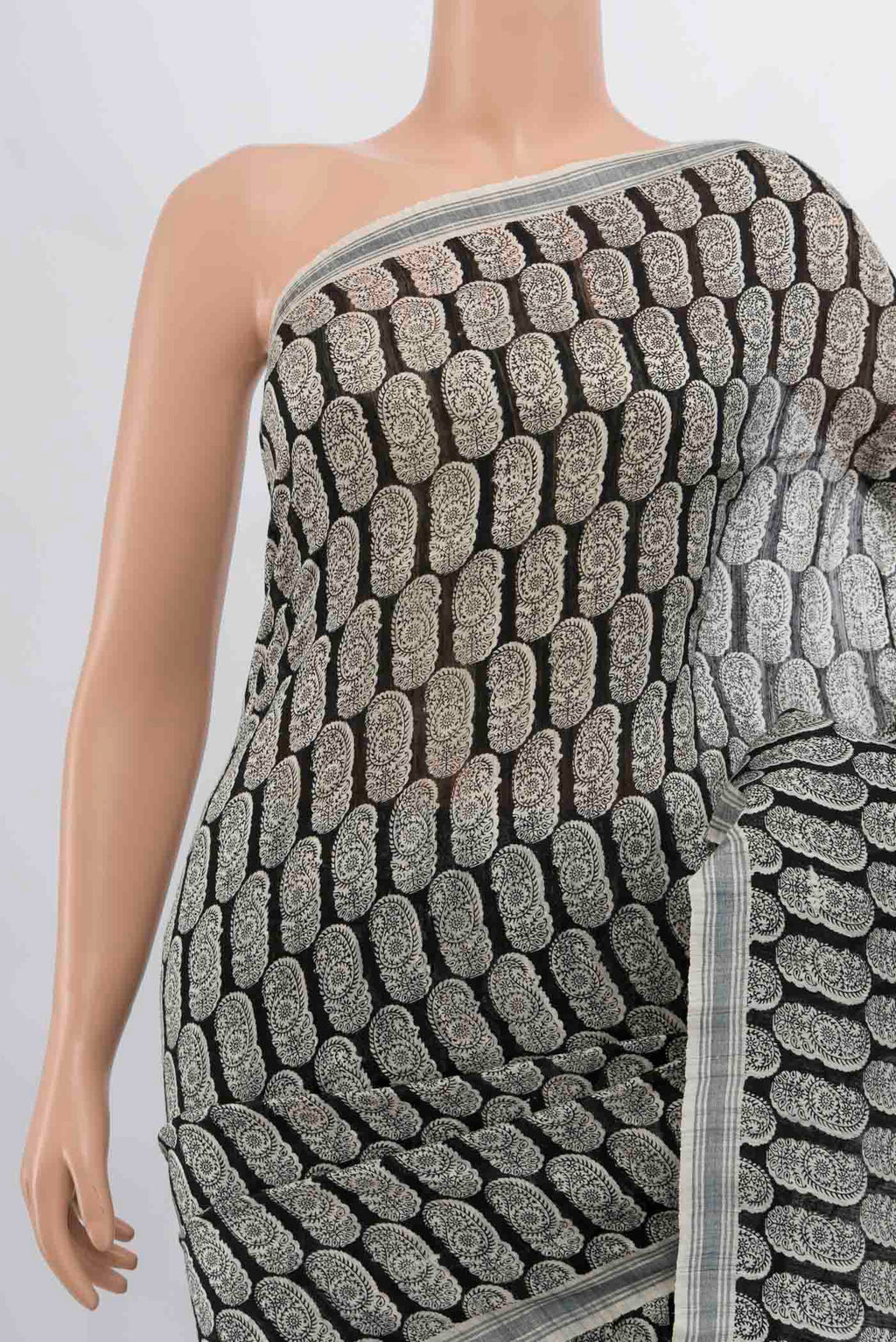 Border image of Black Tussar Silk Saree with Zari Butta on the body and Silk Border