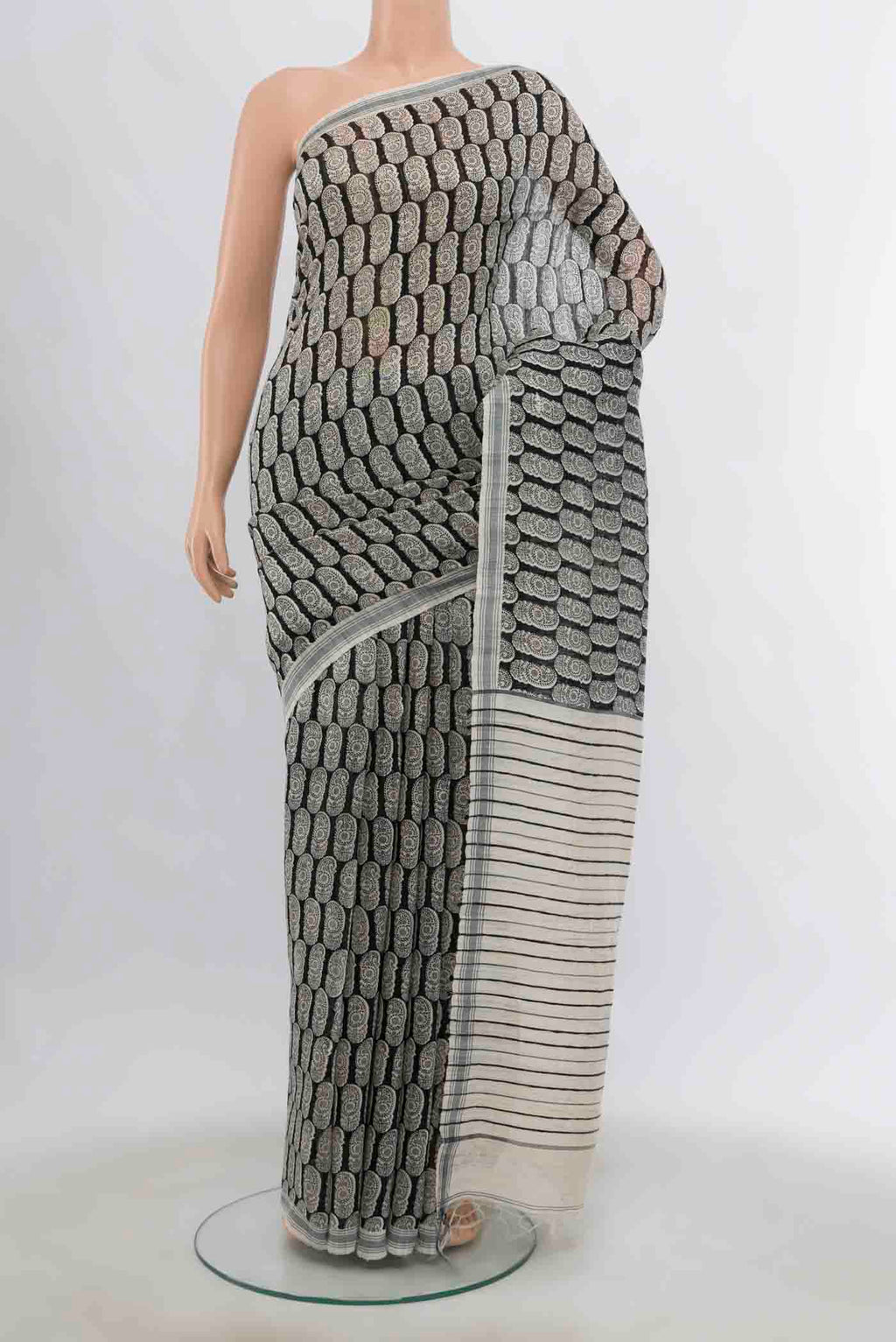 Black Tussar Silk Saree with Zari Butta on the body and Silk Border displayed on a mannequin