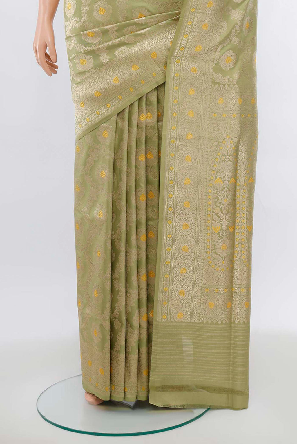 Pleats and pallu of Pista Green Banarasi Silk Saree with Zari Brocade on the body and Silk Border. 