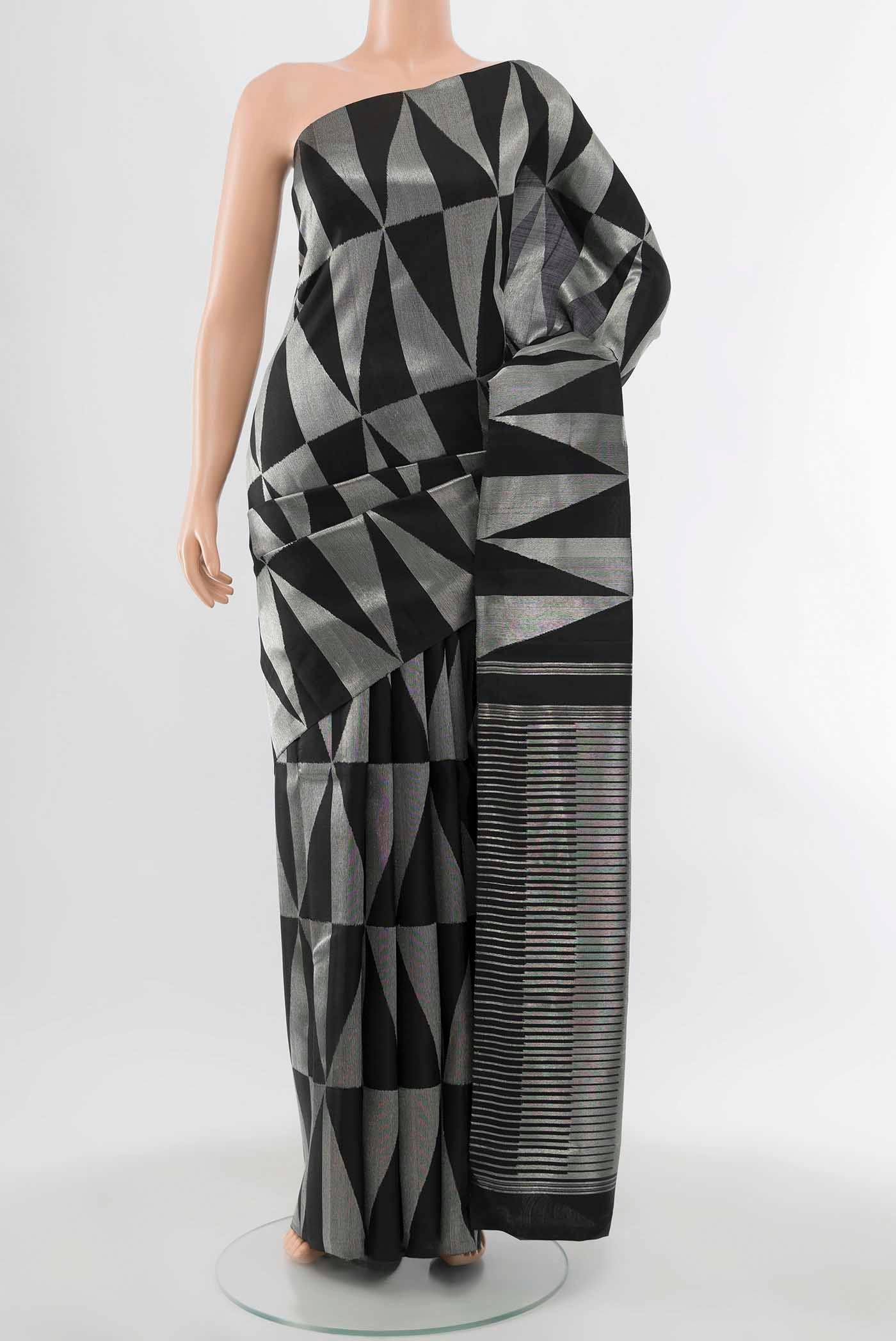 Pure Silk Pure Zari Black Kanchipuram Saree with Zari Butta on the body and Zari Border displayed on a mannequin
