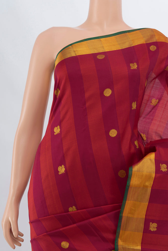 Border image of Maroon Kanjivaram Silk Saree with Zari Brocade on the body and Silk Border. 
