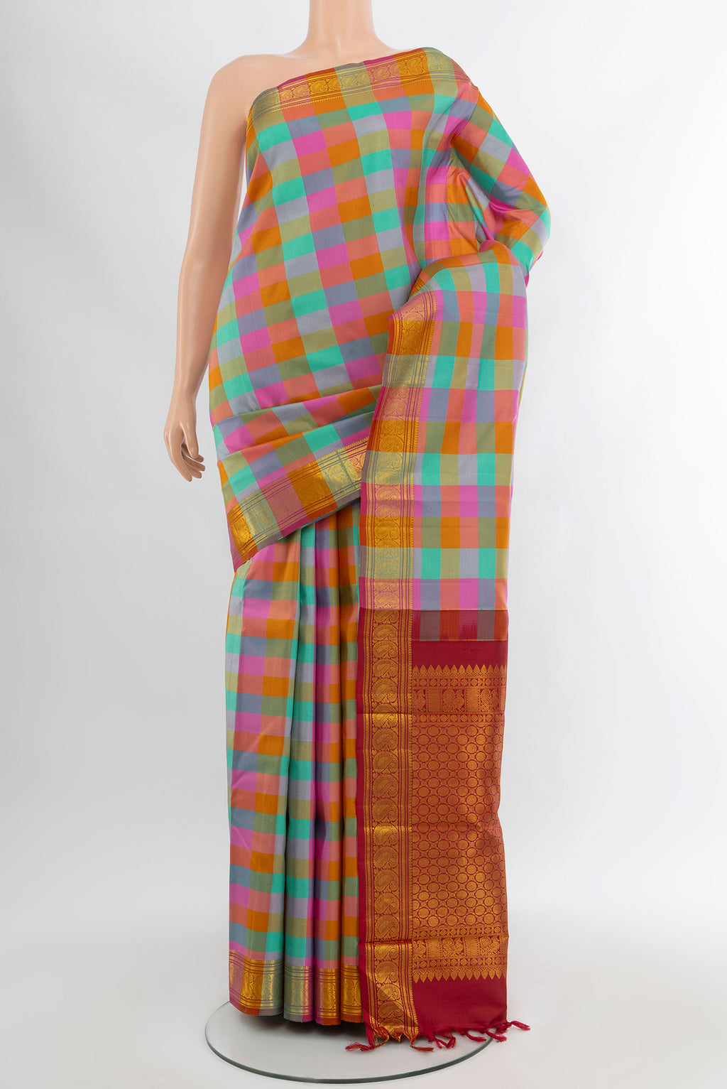 Pure Silk Pure Zari Multi Color Kanchipuram Saree with Checked design on the body and Silk Border.  displayed on a mannequin