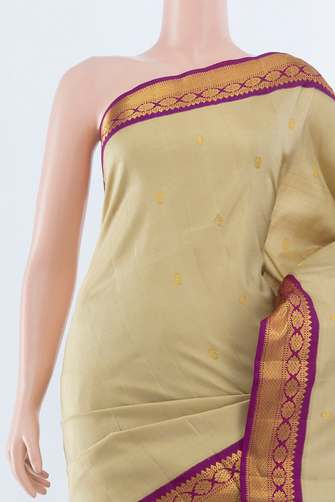 Border image of Beige Kanchipuram Silk Saree with Zari Butta on the body and Silk Border. 