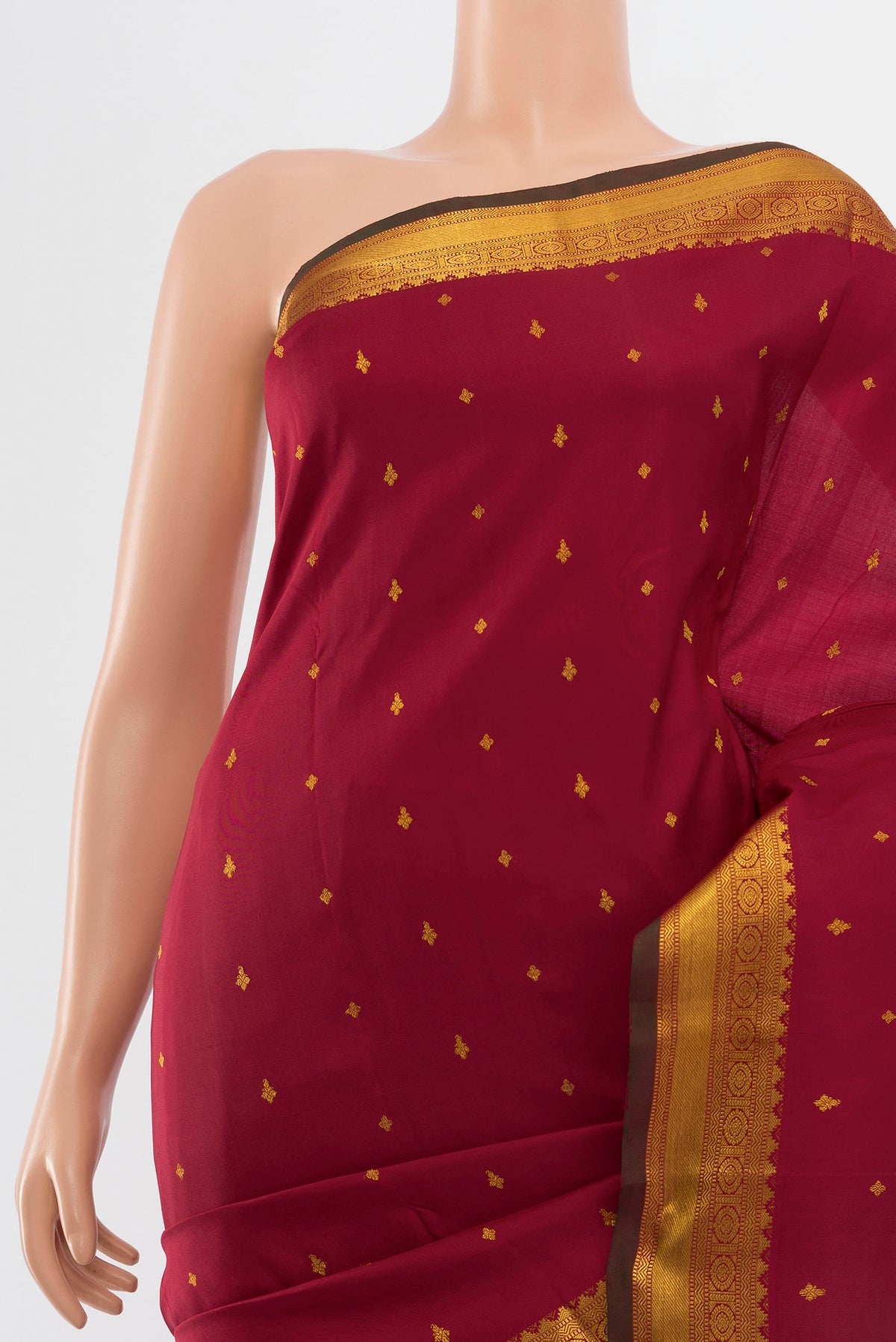 Border image of Pure Silk Pure Zari Maroon Kanchipuram Saree with Zari Butta on the body and Silk Border. 