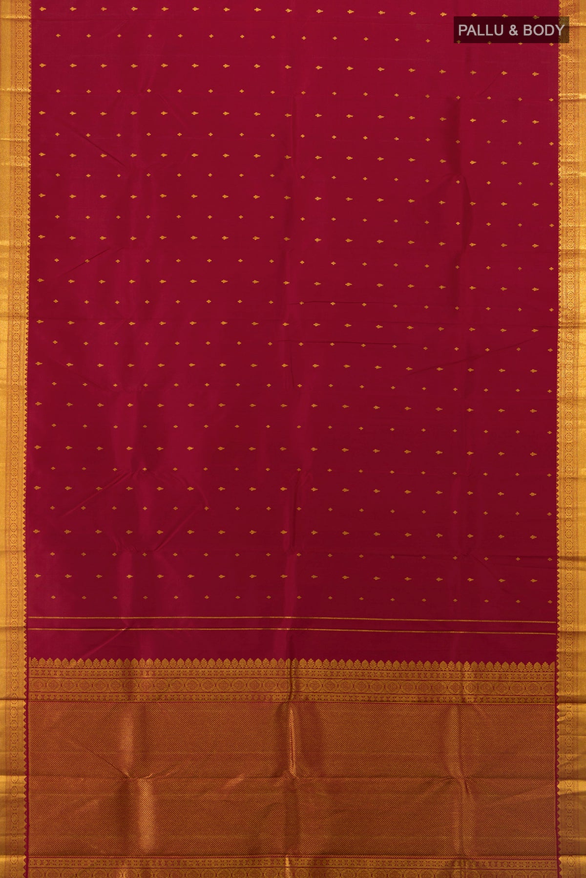 Flat view of Pure Silk Pure Zari Maroon Kanchipuram Saree with Zari Butta on the body and Silk Border. 