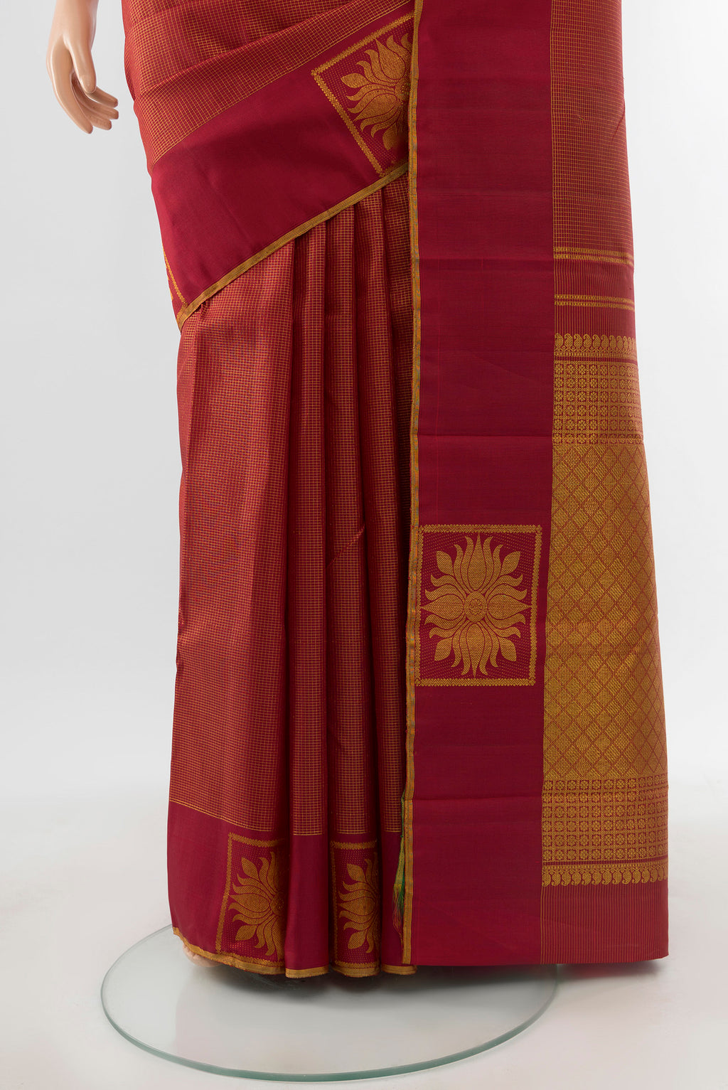 Pleats and pallu of Maroon Kanjivaram Silk Saree with Checked design on the body and Fancy Border. 