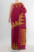 Pure Silk Maroon Kanjivaram Saree with Plain Body and Temple Border.  displayed on a mannequin