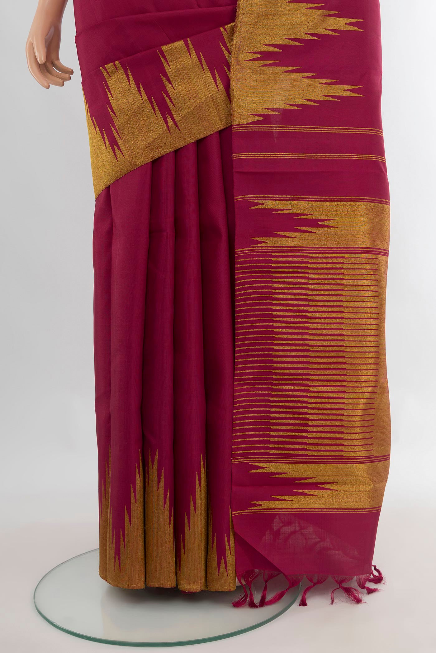 Pleats and pallu of Pure Silk Maroon Kanjivaram Saree with Plain Body and Temple Border. 