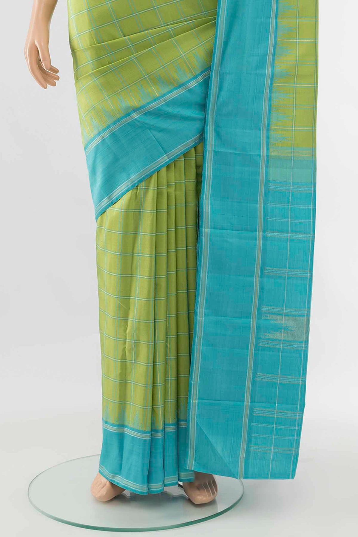 Pleats and pallu of Pista Green Kanchipuram Silk Saree with Zari Butta on the body and Silk Border