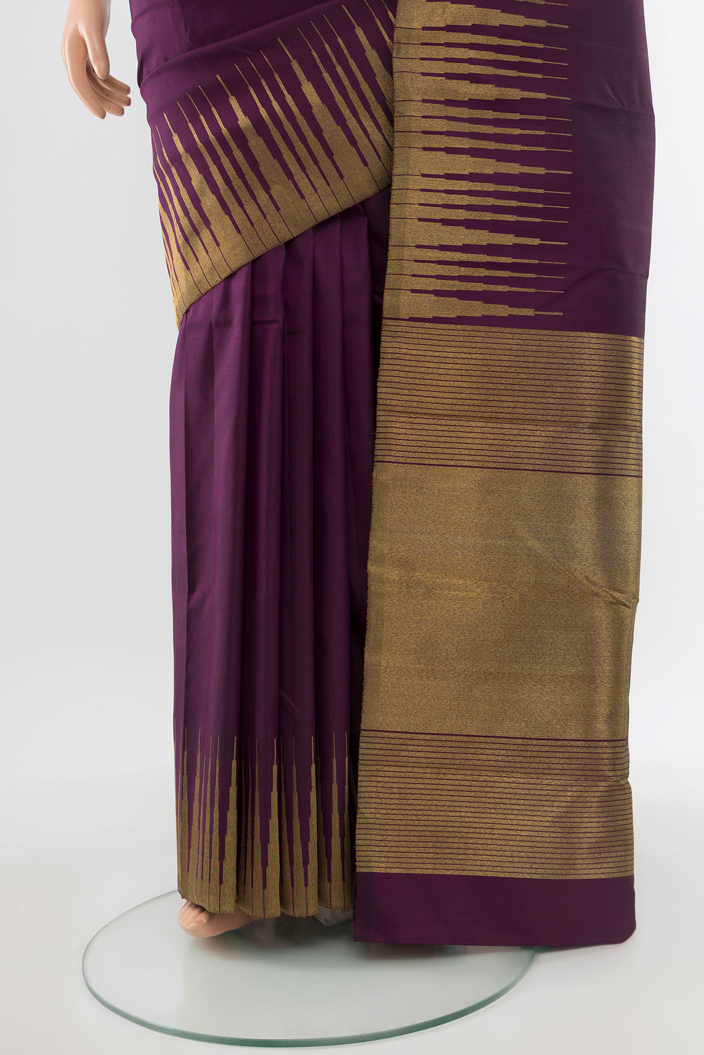 Pleats and pallu of Pure Silk Pure Zari Violet Kanchipuram Saree with Zari Butta on the body and Silk Border. 
