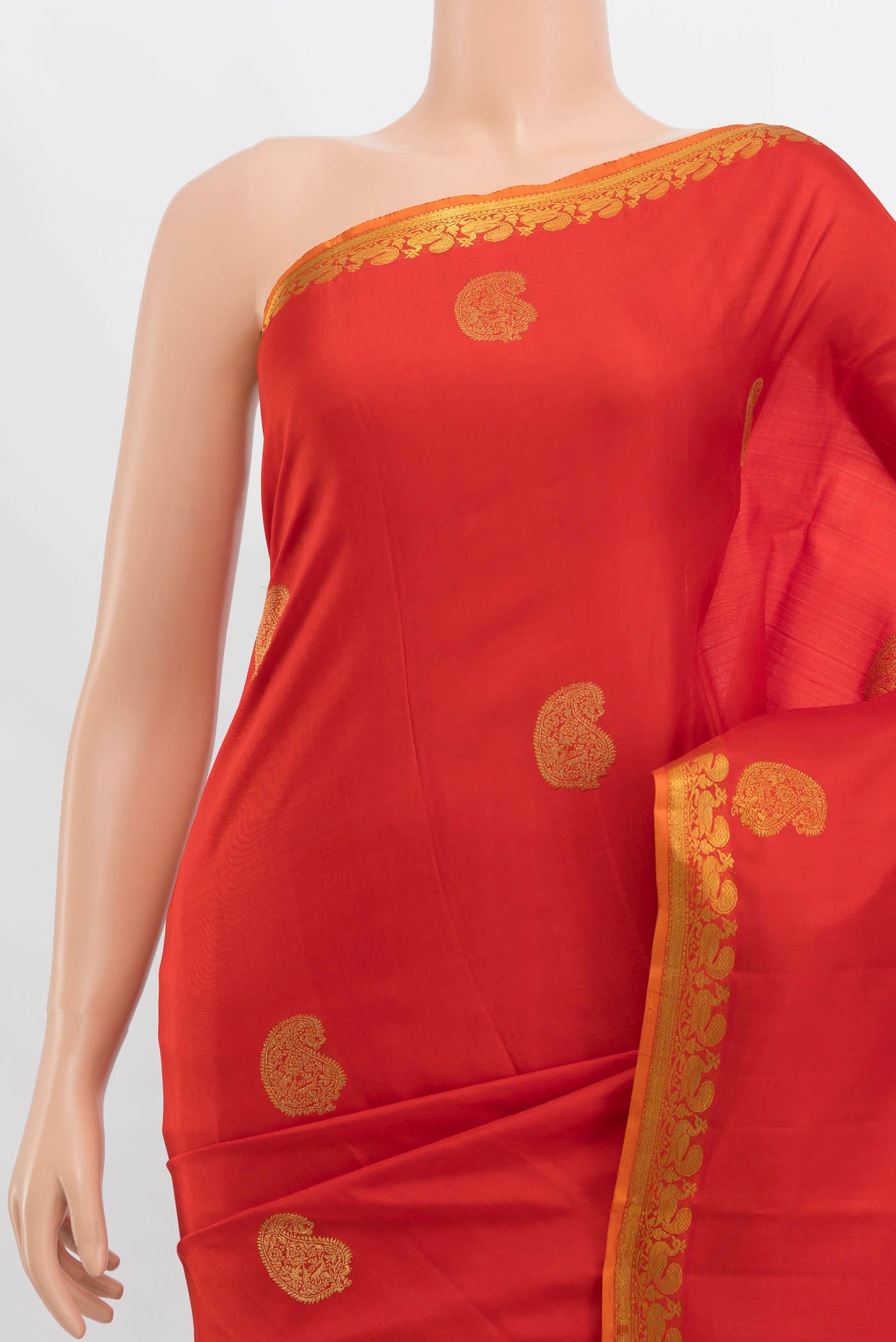Border image of Orange Kanjivaram Silk Saree with Zari Butta on the body and Zari Border. 