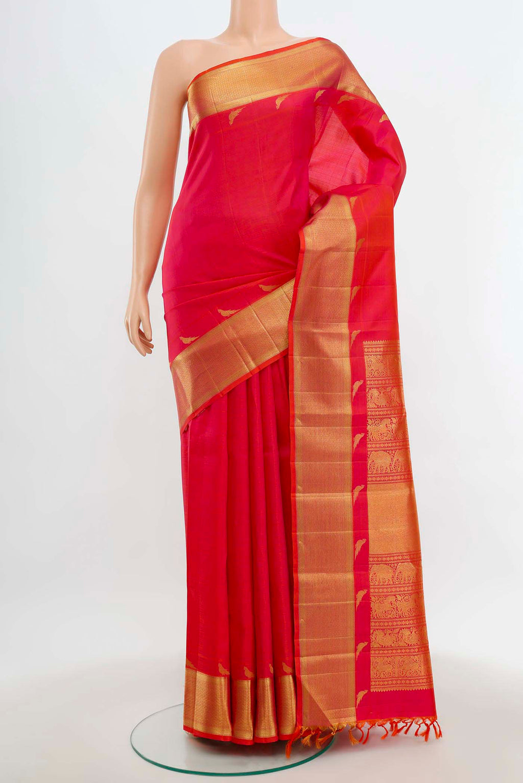 Imperial Pink Kanchipuram Silk Saree with Zari Butta on the body and Silk Border.  displayed on a mannequin