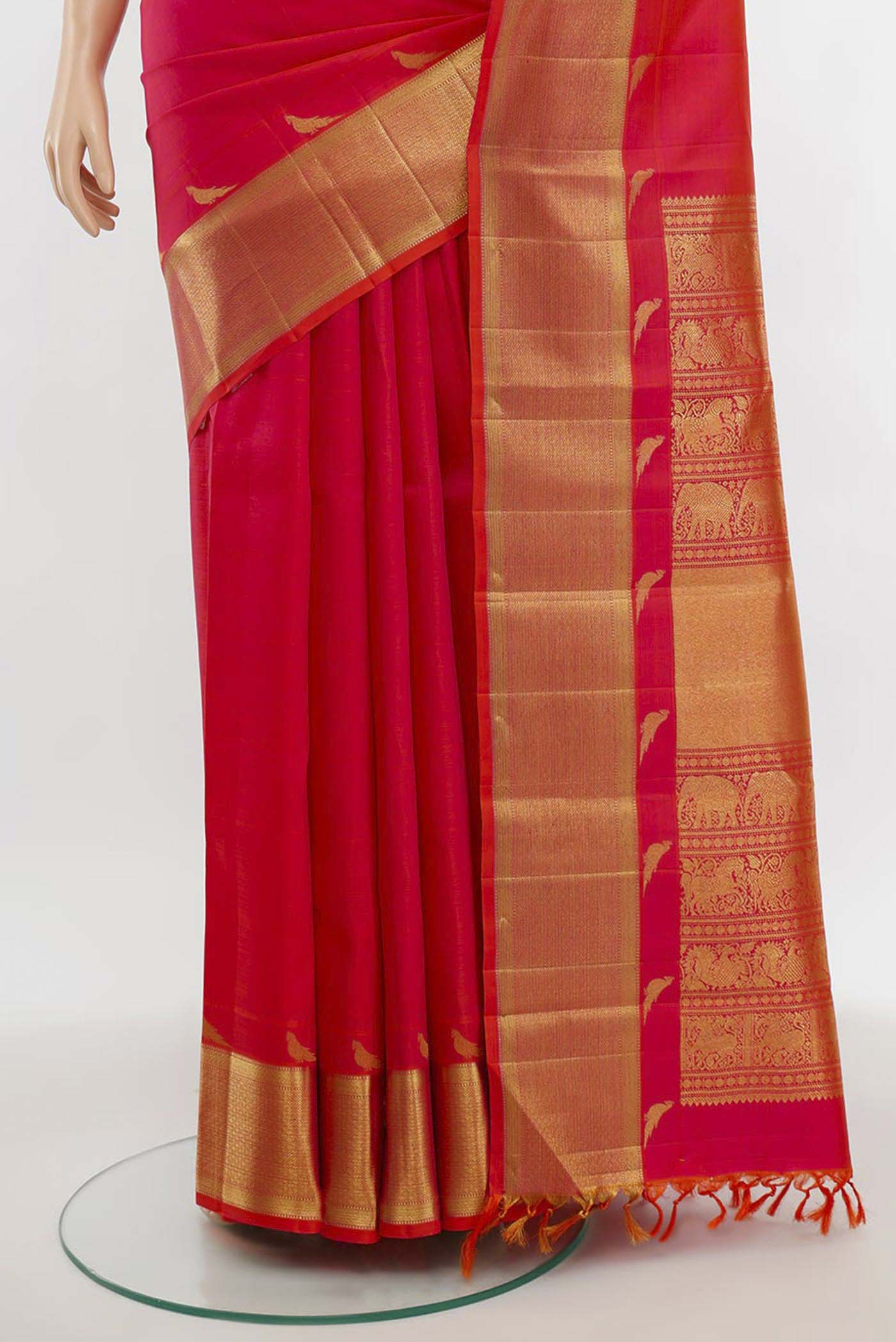 Pleats and pallu of Imperial Pink Kanchipuram Silk Saree with Zari Butta on the body and Silk Border. 
