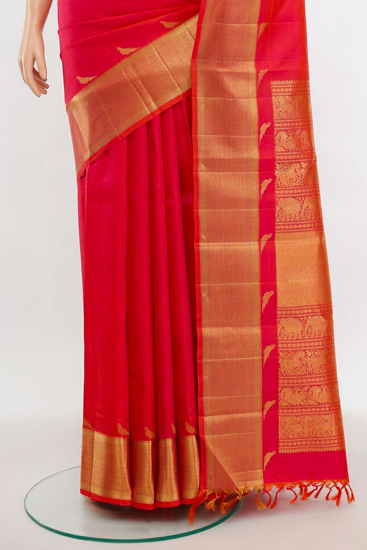 Pleats and pallu of Imperial Pink Kanchipuram Silk Saree with Zari Butta on the body and Silk Border. 
