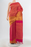 Golden Kanchipuram Silk Saree with Zari Butta on the body and Silk Border.  displayed on a mannequin