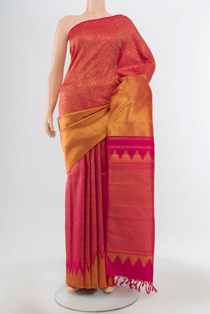 Golden Kanchipuram Silk Saree with Zari Butta on the body and Silk Border.  displayed on a mannequin