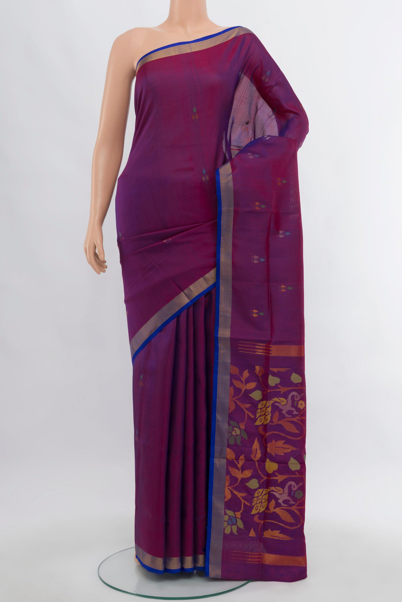 Purple Uppada Silk Saree with Zari Butta on the body and Silk Border.  displayed on a mannequin