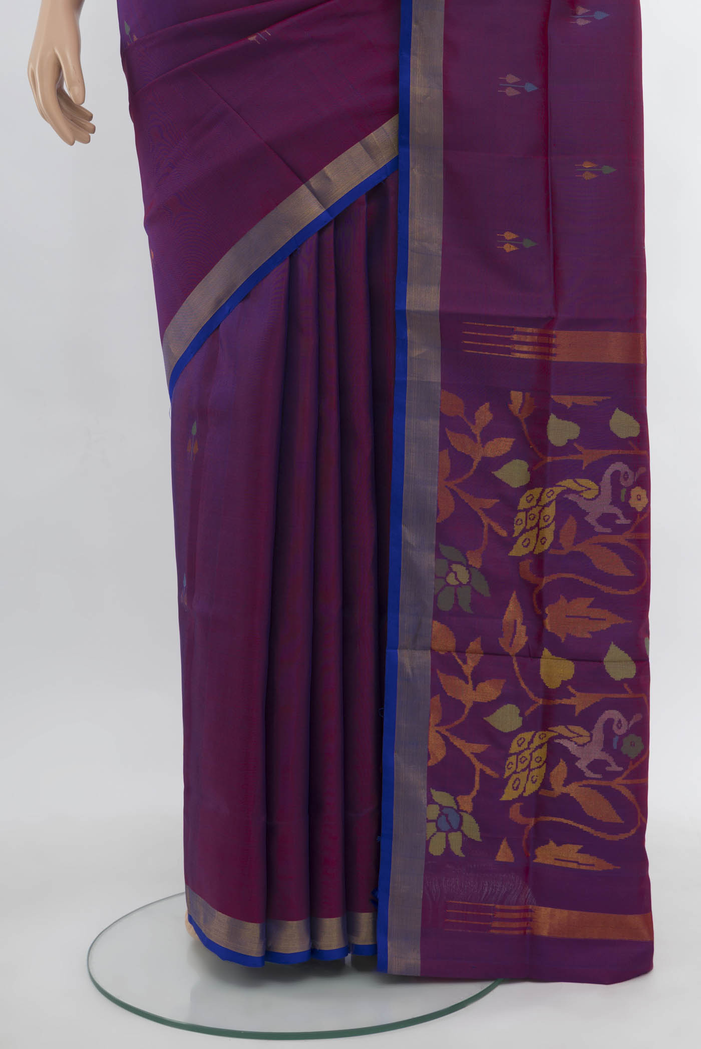 Pleats and pallu of Purple Uppada Silk Saree with Zari Butta on the body and Silk Border. 