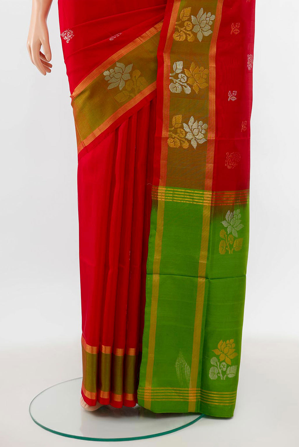 Pleats and pallu of Maroon Uppada Silk Saree with Zari Butta on the body and Silk Border. 