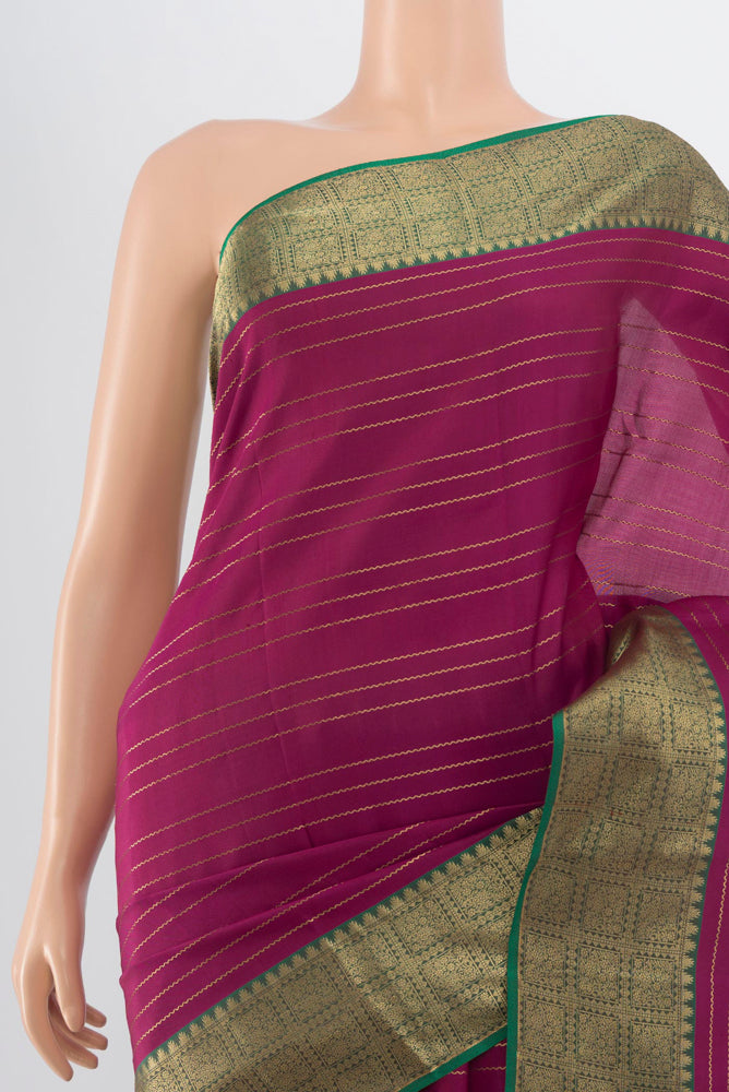 Border image of Purple Kanchipuram Silk Saree with Zari Butta on the body and Silk Border. 