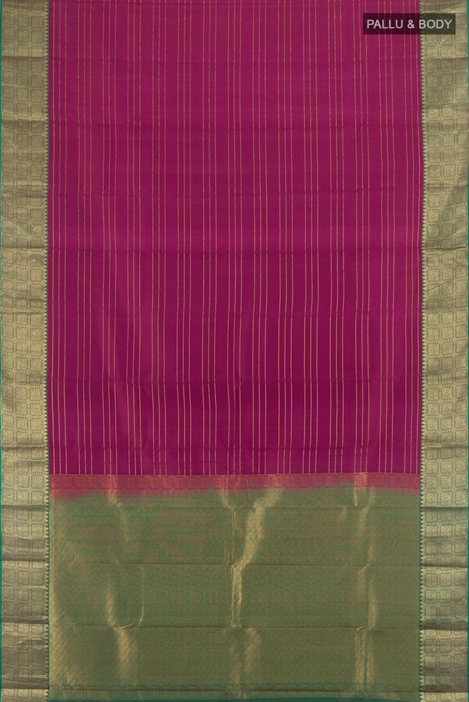 Flat view of Purple Kanchipuram Silk Saree with Zari Butta on the body and Silk Border. 