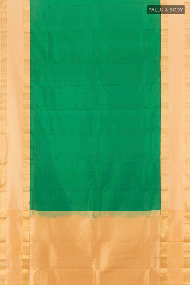 Flat view of Bottle Green Kanchipuram Silk Saree with Zari Butta on the body and Silk Border. 
