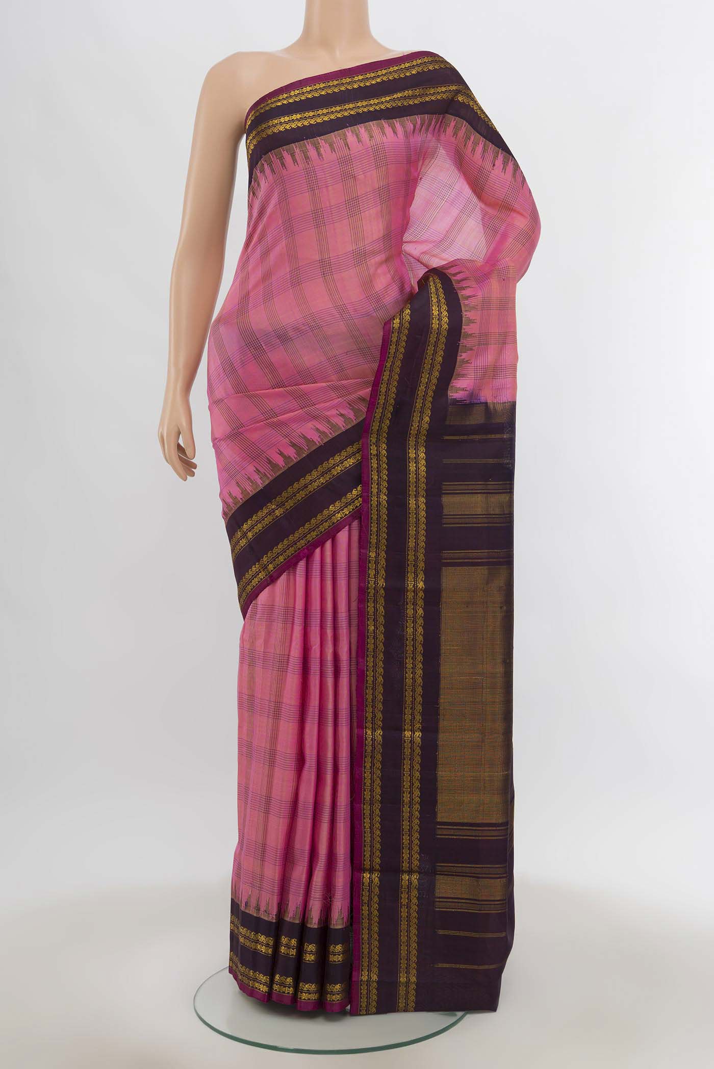 Imperial Pink Gadwal Silk Saree with Zari Butta on the body and Silk Border.  displayed on a mannequin