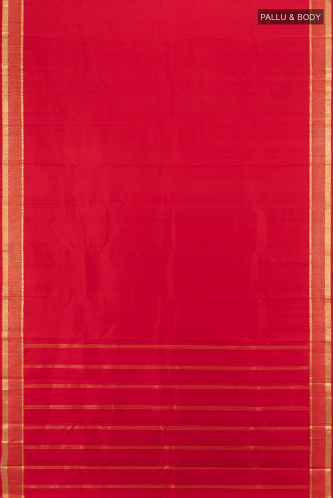 Flat view of Deep Red Kanjivaram Silk Saree with Zari Butta on the body and Silk Border. 