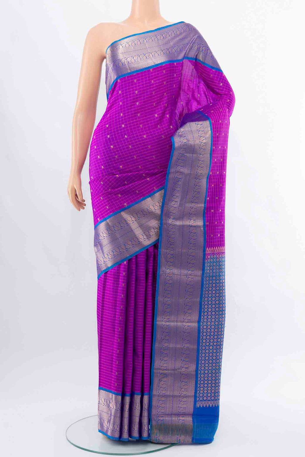 Purple Kanchipuram Silk Saree with Zari Butta on the body and Silk Border displayed on a mannequin
