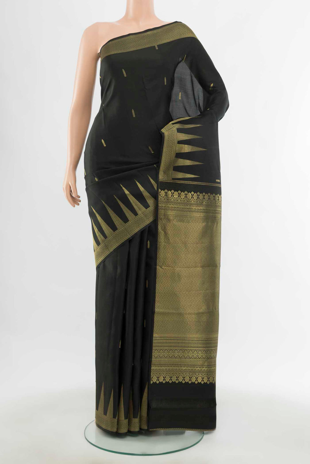 Black Kanchipuram Silk Saree with Zari Butta on the body and Silk Border displayed on a mannequin